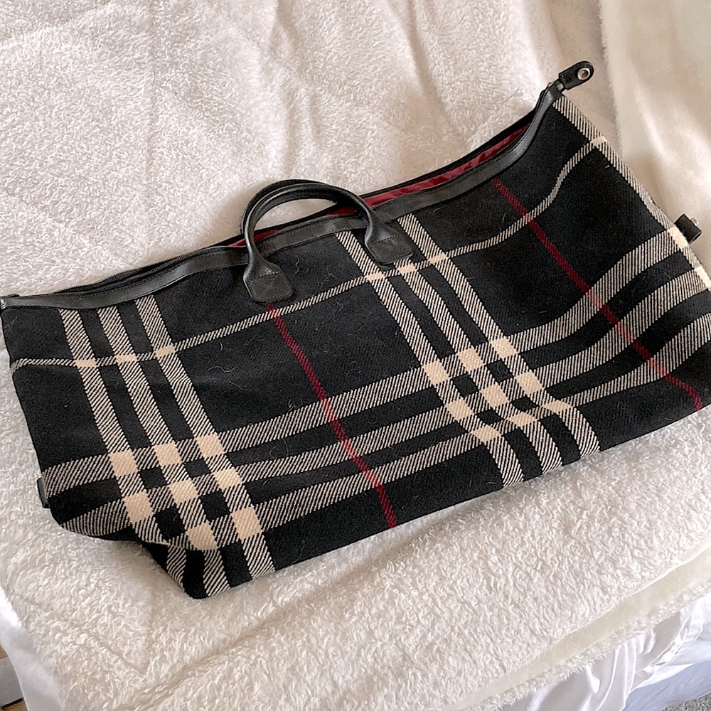 Burberry London made in Italy plaid weekender bag. 27” wide by 16” tall.